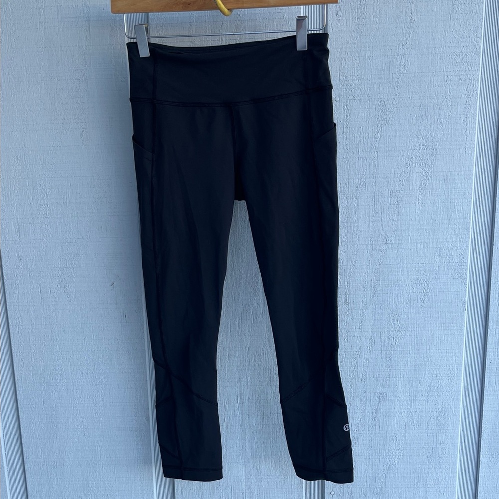 Lululemon Final Lap Crop 23” Black Leggings Nulux Zip pocket Running size 4